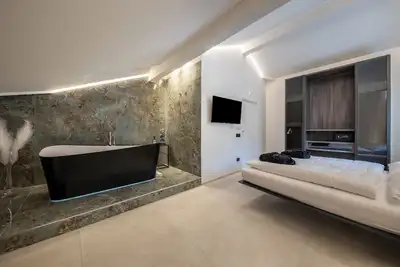 Image de Appartement 'App 302 Palazzo Cavour' avec vue sur les montagnes e Wi-Fi