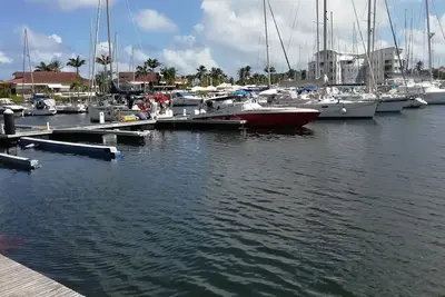Image de saint François studio 2 personnes avec 3 piscines à 150m de la plage