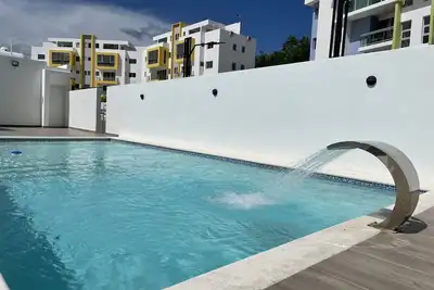 Image de Cozy Apartment with Pool View 10 minutes Usa Embassy