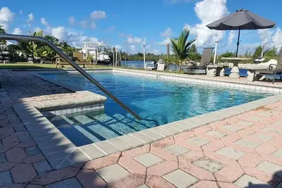 Waterfront home with private dock near the beach
