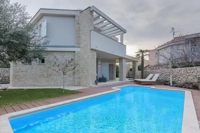 Image de Maison de vacances Novalja pour 1 - 9 personnes avec 4 chambres à coucher - Maison jumelée