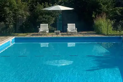 Image de Le Patio, avec accès au parc privé et à la piscine, près de Bergame