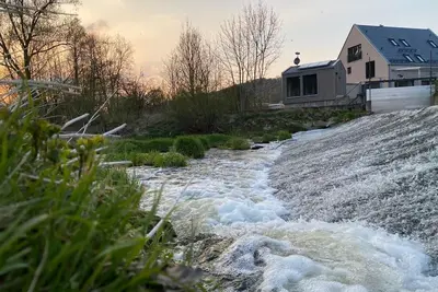 Image de Luxury vacation home by the river, sunbathing lawn, sauna, fireplace, barrier-free first floor