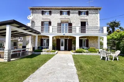 Image de Slavica 4 appartement en bord de mer, Umag-Punta deux chambres, grand jardin