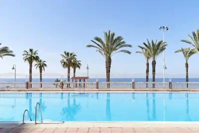 Image de Appartement à Algarrobo Costa avec vue sur mer, piscine, Wi-Fi, climatisation, terrasses et jardin