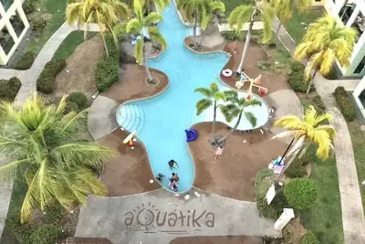 Image de Aquatika  Caribbean Breeze - The Penthouse Direct Access to the Beach & 5 Pools
