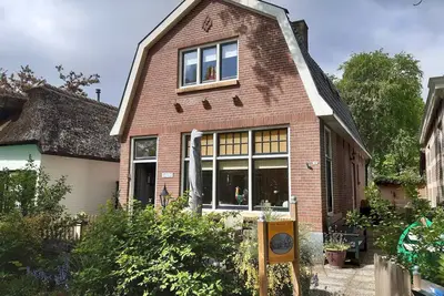 Image de Appartement א Giethoorn avec parking
