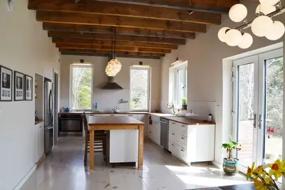 Image de Stone Eco House on 120 acres with a pond, meadows, brook, and hiking trails.