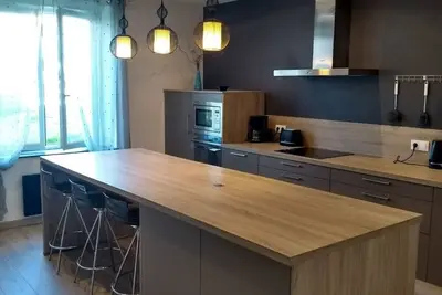 Image de Appartement au rez-de-chaussée de 40 m² - Grande cuisine entièrement équipée