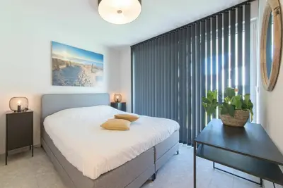 Image de Confortable appartement dans une maison de vacances avec Wifi, climatisation, Tv, balcon et parking