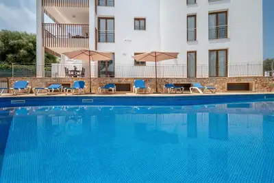 Image de Appartement \"Vaixell Planta Baja\" proche plage, vue mer, piscine, Wi-Fi, clim, terrasse et jardin