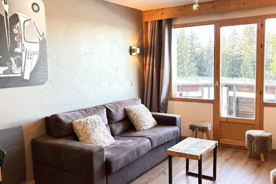Image de Charmant 3 pièces rénové avec balcon et vue montagne