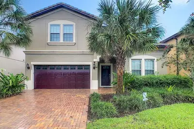 Image de 8br Slp17 Lux Villa NrDisney PoolSpa WaterPark Lazy River Arcade Gym No Rsrt Fee