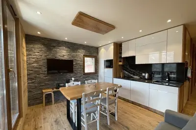 Image de Appartement rénové  classé 4 * avec vue panoramique sur le village