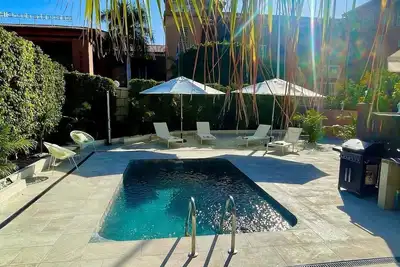 Luxury townhouse with private and heated pool next to the Beach!