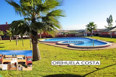 Image de Appartement avec grand solarium sur le toit, piscine, jardin, barbecue, climatisation et Wi-Fi.