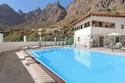 Image de Vivienda Vacacional Risco Blanco avec vue sur la montagne, piscine partagée, climatisation et Wi-Fi.