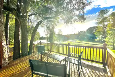 Image de Hidden Lake View Cottage 5 miles from Disney!