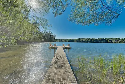 Image de Spacious lakefront home on lush 5-acre lot with sunny deck & private dock