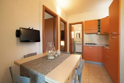 Image de Appartement de vacances \"orchidea\" avec piscine et plage privée