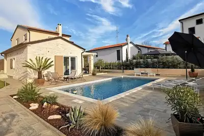 Image de Maison de vacances avec piscine et sauna