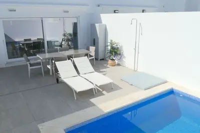 Image de Very modern and tastefully furnished terraced house with small private pool