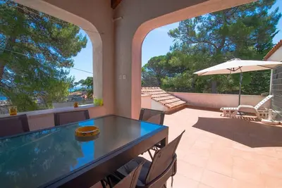 Image de Appartement de vacances Veli Losinj pour 1 - 4 personnes avec 2 chambres à coucher - Maison jumelée