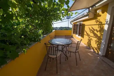Image de Appartement de vacances Veli Losinj pour 1 - 4 personnes avec 1 chambre à coucher - Maison jumelée