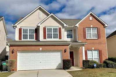 Image de 4br Home Near I-85/I-285 Ideal for Remote Work/Study