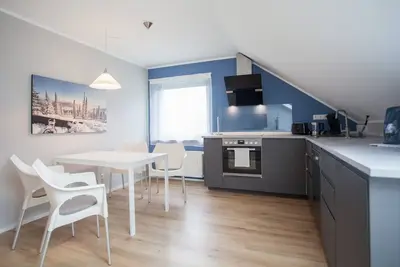 Image de A bright, comfortable apartment at the edge of the forest near the Hillebachsee