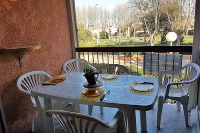 Image de T2 mezzanine proche commerces avec parking privatif - 4oli76