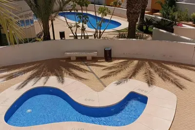 Image de Beautiful apartment with private roof terrace, indoor & out door swimming pool.