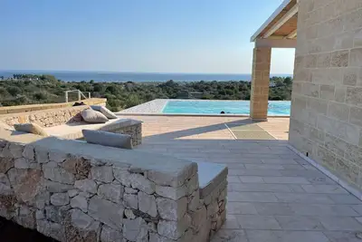 Image de Blue door Trullo with sea view pool