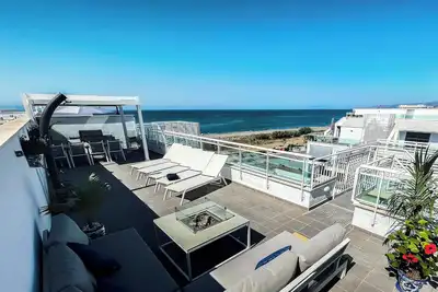Image de Appartement 'Atico Bremadito' près de la plage avec vue sur la mer et piscine extérieure