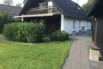 Image de Exclusive villa près de Stockholm - la ville le jour, barbecue dans le jardin le soir