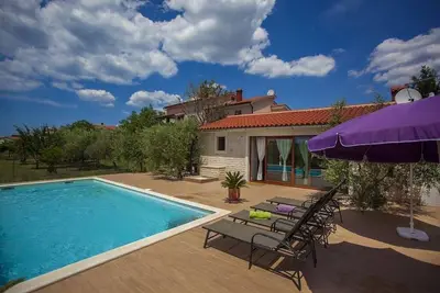 Image de Maison de vacances avec 2 appartements à Valbandon