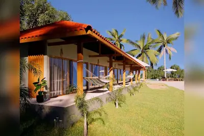 Image de Casa Caju. New house on Mirror Beach, located in the Outeiro das Brisas condominium with all the comforts for your vacation.