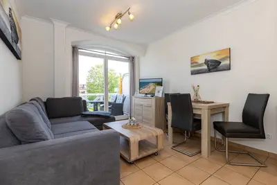 Image de Apartment with sunny balcony - sauna area in the house and only 100 m to the beach! -