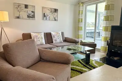 Image de Family-friendly apartment with infrared sauna, fireplace & balcony near the beach -