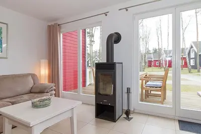 Image de Great vacation home with infrared sauna, fireplace and south-facing terrace - 700 m to the beach! -