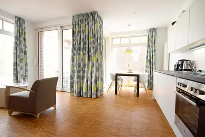 Image de Beautiful vacation apartment with sunny loggia - only 100 m to the North Sea beach! -