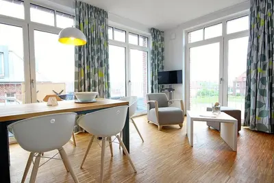 Image de Great vacation apartment with large, sunny south-facing balcony - only 100 m to the beach! -