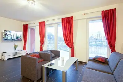 Image de Great vacation apartment on the North Sea with south-facing balcony, sauna and whirlpool bath -