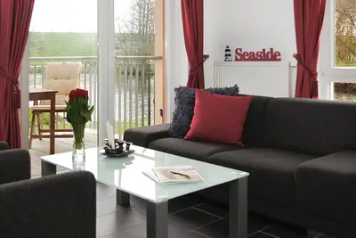 Image de Apartment with private sauna and great balcony on the Graft with a view of the dike!