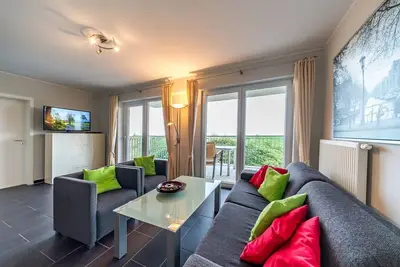 Image de Vacation apartment by the North Sea with a great balcony by the water and its own sauna