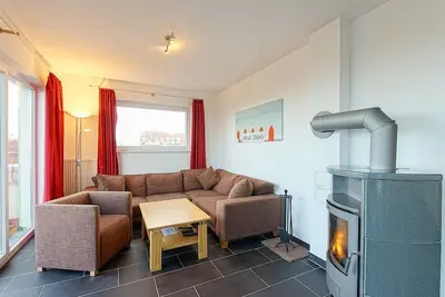 Image de Great North Sea apartment with 54 sqm roof terrace, sea view, sauna and wood-burning stove!