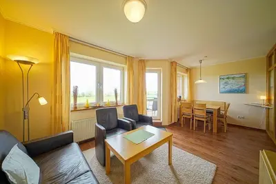 Image de Beachfront, light-flooded vacation apartment on the North Sea with sea view and Wlan