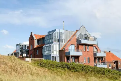 Image de Vacation apartment with sunny loggia overlooking the Wadden Sea - only 70 m to the beach
