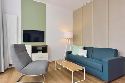Image de Great apartment right on the beach with west-facing terrace - including the sound of the sea!