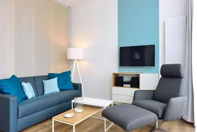 Image de Great apartment with west-facing terrace and beach chair - including the sound of the sea! -